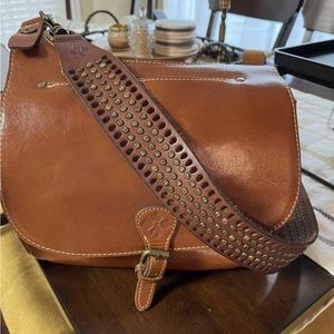 Stunning auth Patricia Nash saddle bag and matching wallet.